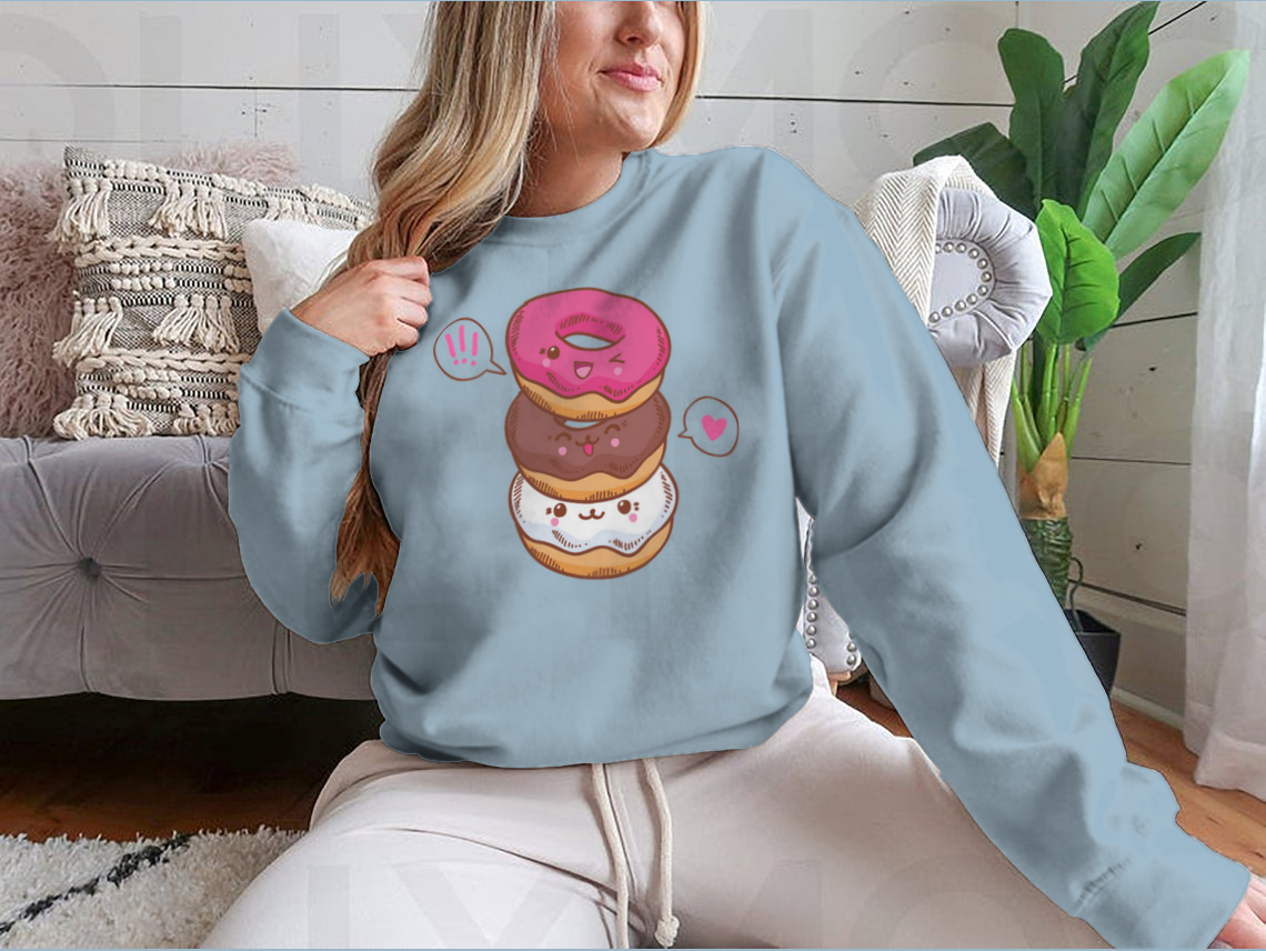 A colorful illustration of three cute kawaii donuts, perfect for T-shirt design, showcasing their playful and vibrant features.