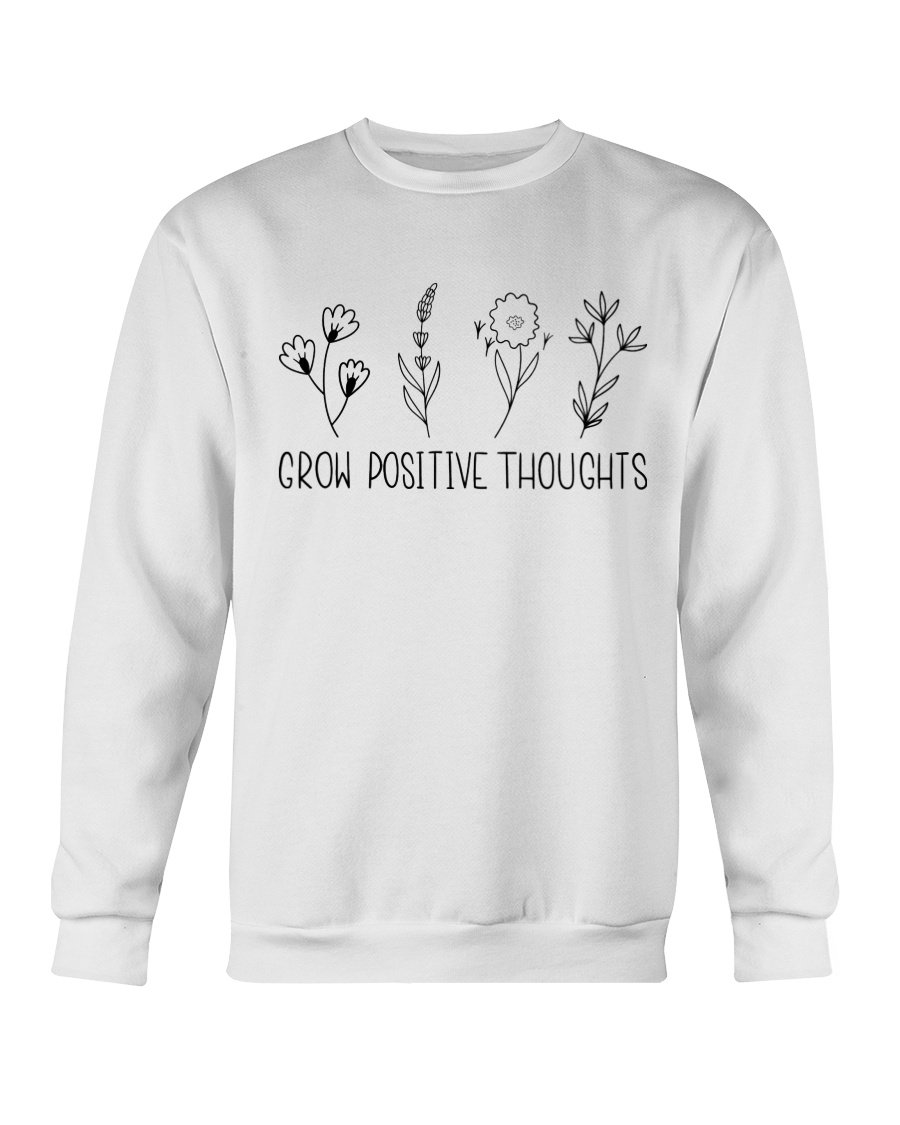 A cozy Gildan crewneck sweatshirt featuring the phrase 'Grow Positive Thoughts' in a stylish font, perfect for casual wear.