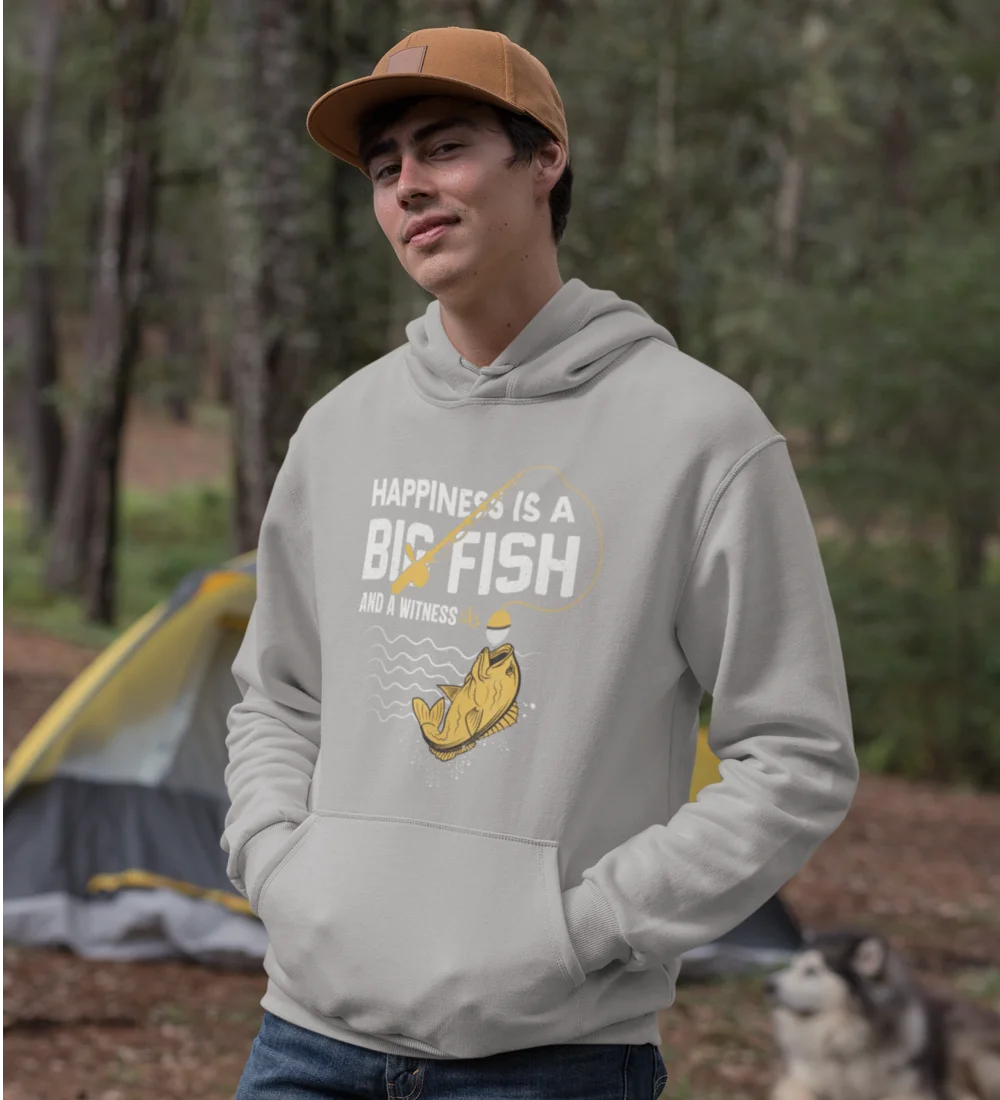 A stylish unisex hoodie featuring a unique design with the phrase 'Happiness Is A Big Fish', made from soft cotton-polyester blend.