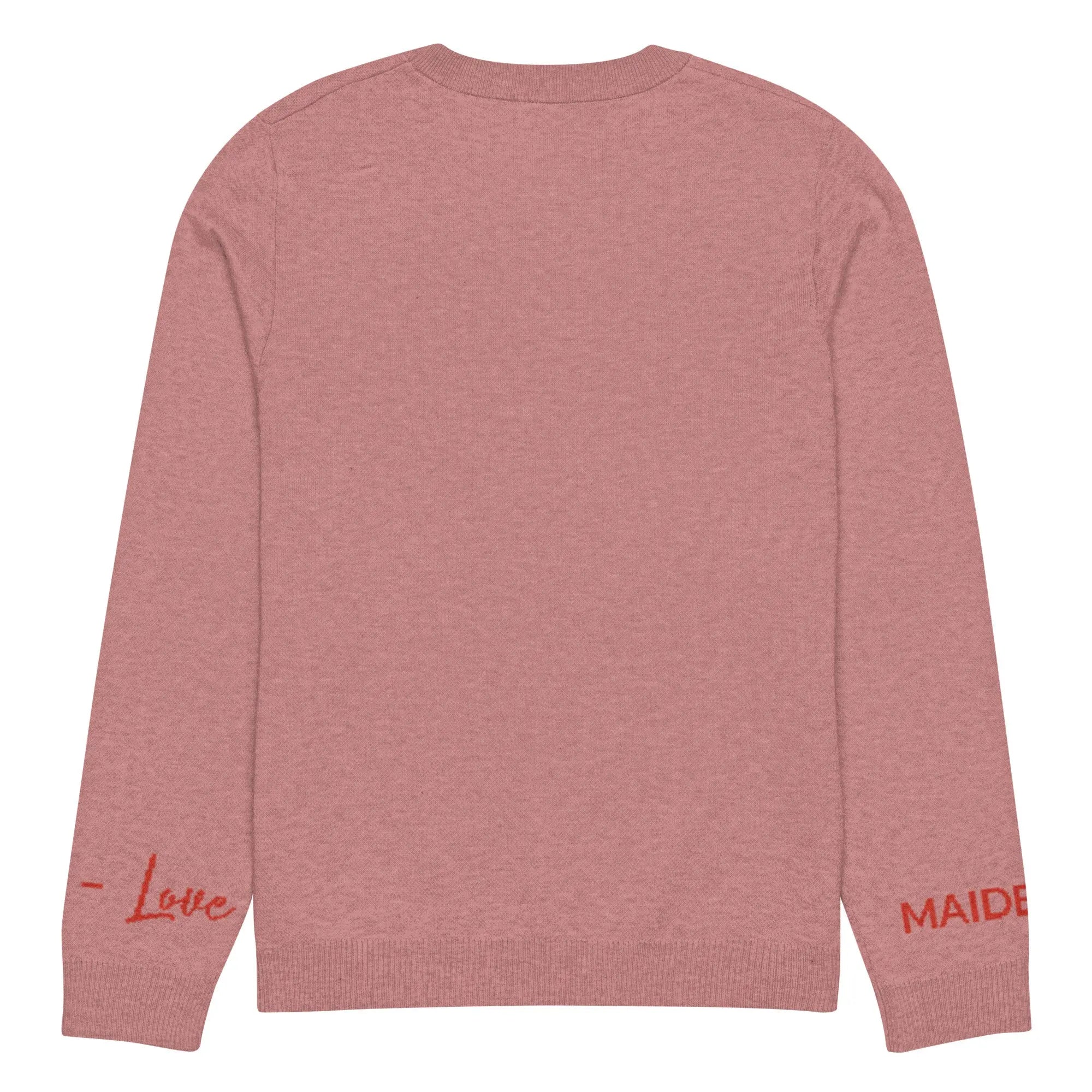 Heart Knitted Crew Neck Sweater in Coral, showcasing its soft fabric and stylish design.