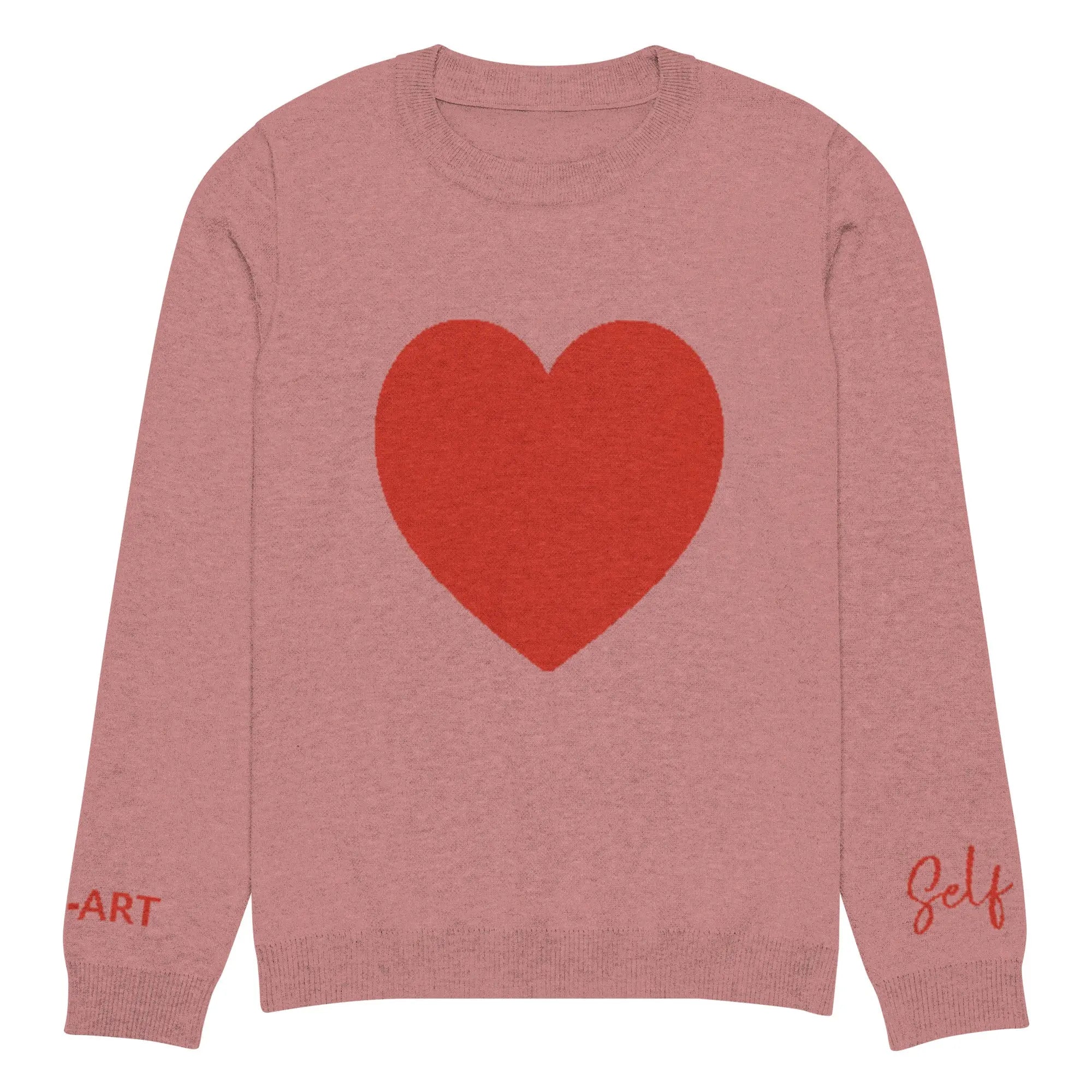 Heart Knitted Crew Neck Sweater in Coral, showcasing its soft fabric and stylish design.