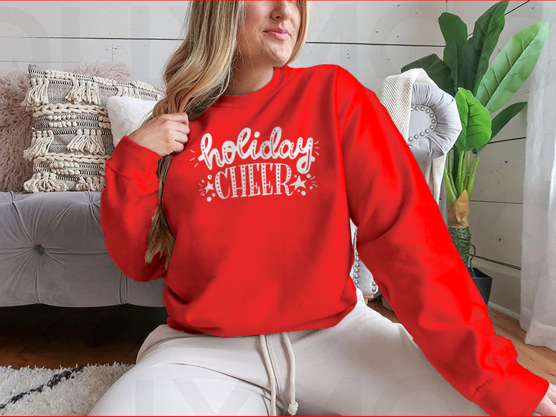 Holiday Cheer apparel featuring unique bright hand lettering and decorative elements, perfect for festive occasions.