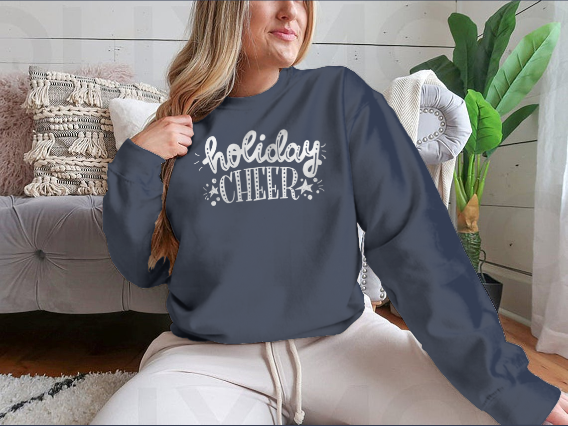 Holiday Cheer apparel featuring unique bright hand lettering and decorative elements, perfect for festive occasions.