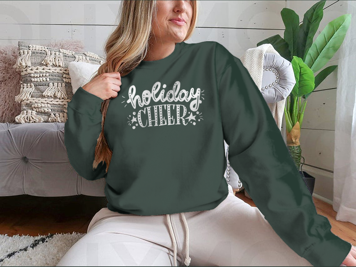 Holiday Cheer apparel featuring unique bright hand lettering and decorative elements, perfect for festive occasions.