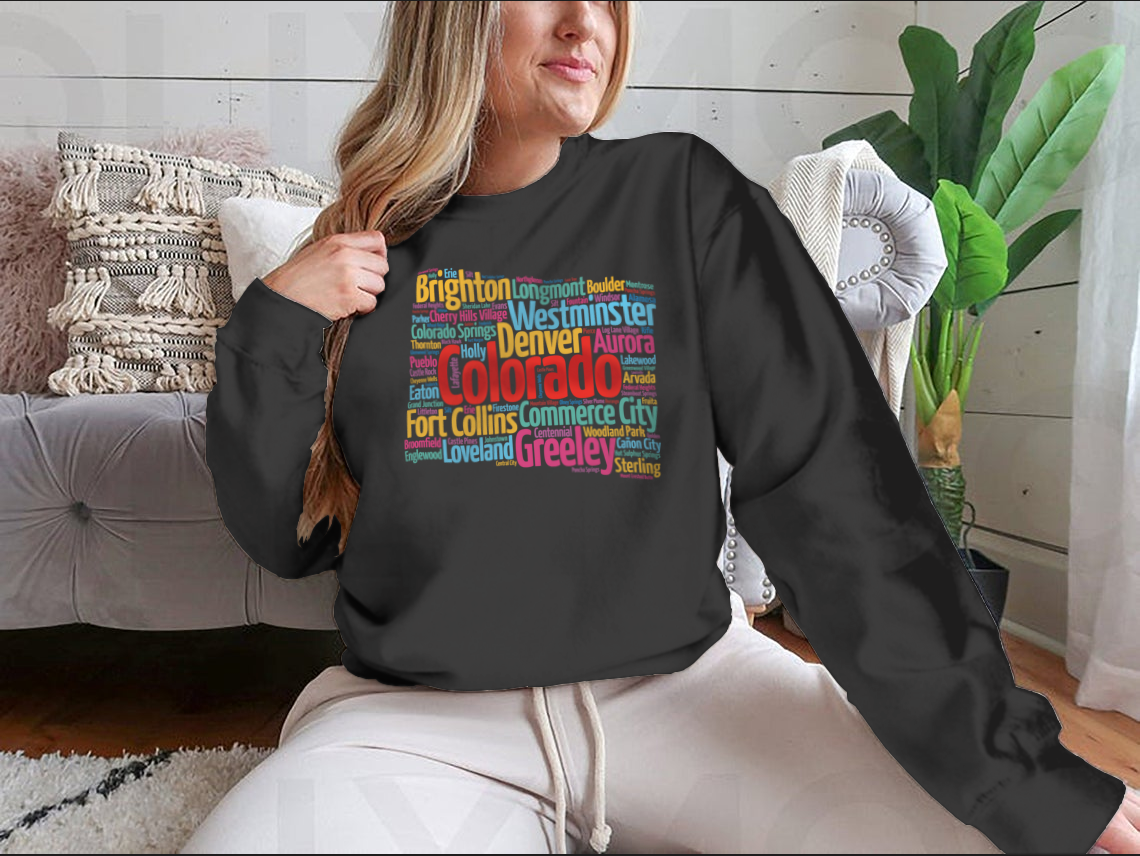 A cozy sweatshirt featuring a list of cities in Colorado, made from 100% cotton, showcasing a classic fit and midweight fabric.