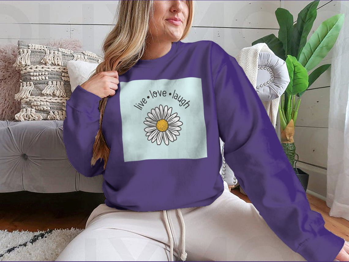 A stylish Live Love Laugh T-shirt featuring a daisy flower vector design, made from soft cotton fabric.