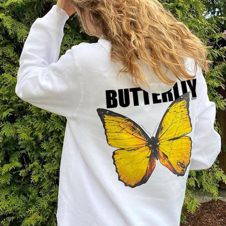 A cozy loungewear hooded sweatshirt made from cotton and polyester, featuring a stylish print and full sleeves.