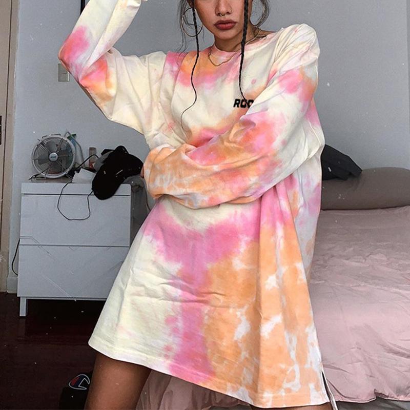 A stylish tie-dye O-neck loose ladies sweatshirt in vibrant colors, showcasing full-length sleeves and a relaxed fit, perfect for casual wear.