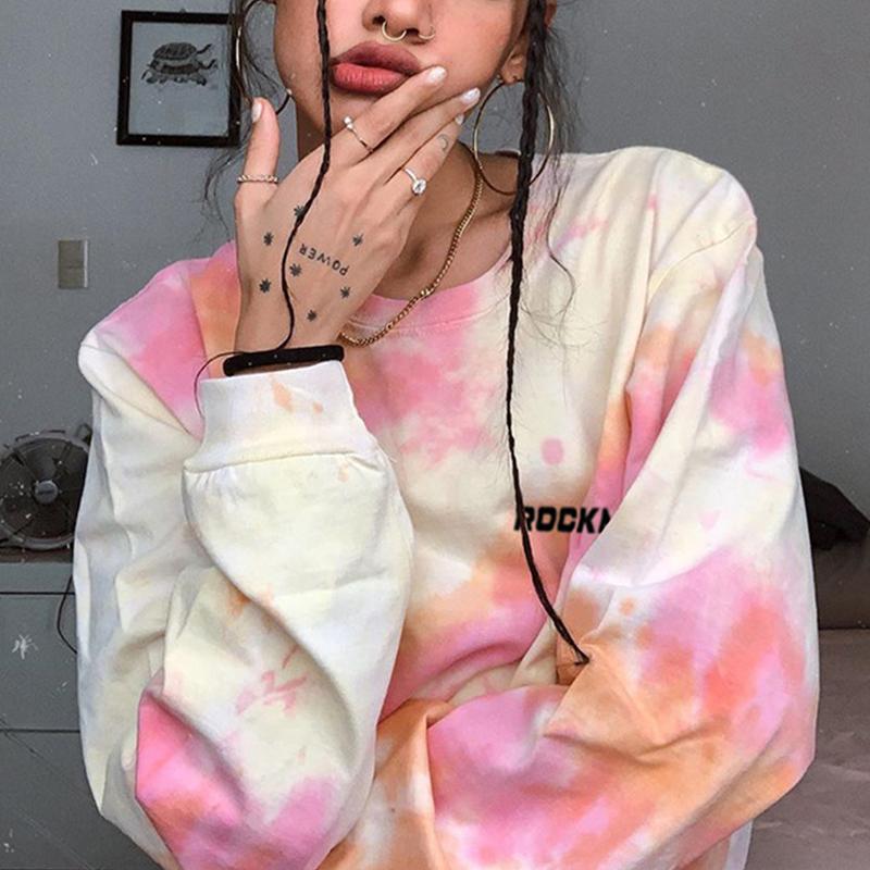 A stylish tie-dye O-neck loose ladies sweatshirt in vibrant colors, showcasing full-length sleeves and a relaxed fit, perfect for casual wear.
