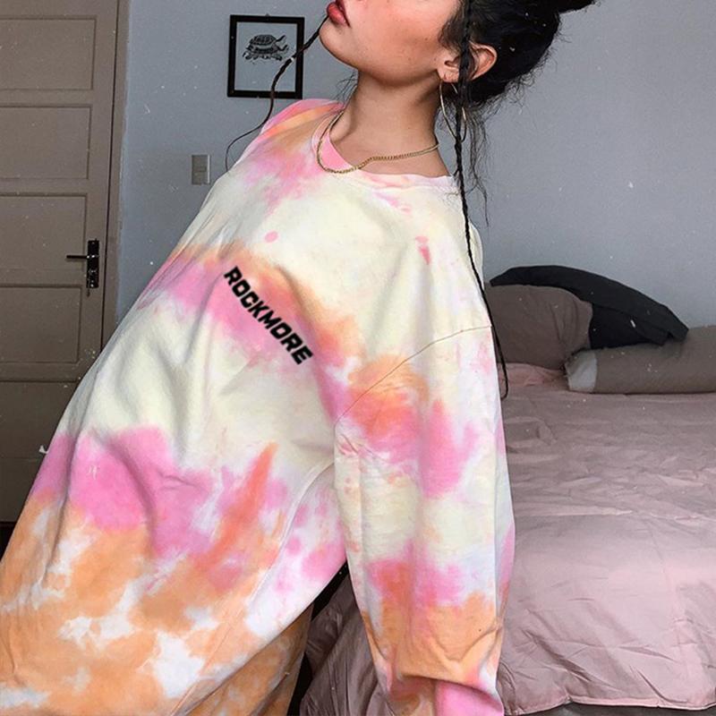 A stylish tie-dye O-neck loose ladies sweatshirt in vibrant colors, showcasing full-length sleeves and a relaxed fit, perfect for casual wear.