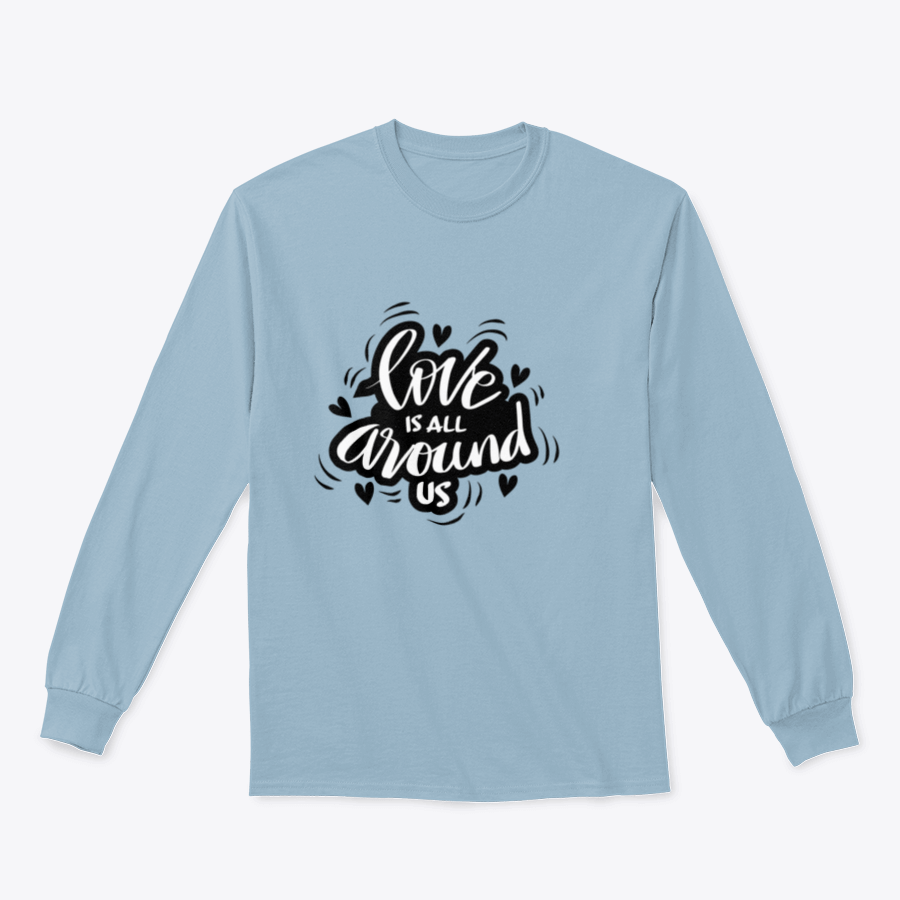 A stylish t-shirt featuring the hand-lettered quote 'Love Is All Around Us', showcasing a motivational design in a comfortable fit.