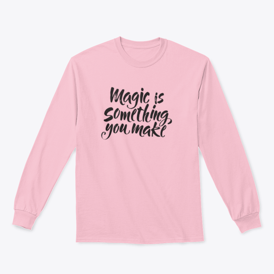 A soft cotton t-shirt featuring the inspirational quote 'Magic Is Something You Make' in a stylish design, perfect for casual wear.