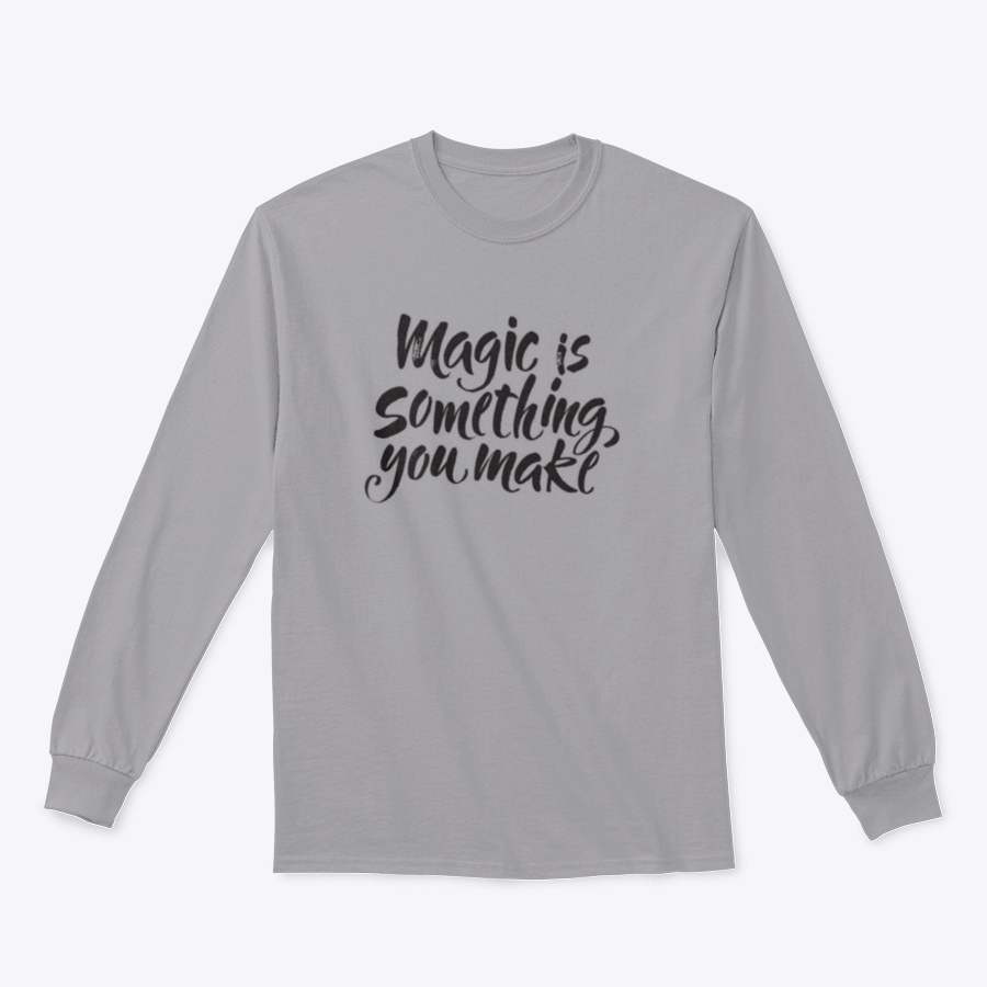 A soft cotton t-shirt featuring the inspirational quote 'Magic Is Something You Make' in a stylish design, perfect for casual wear.