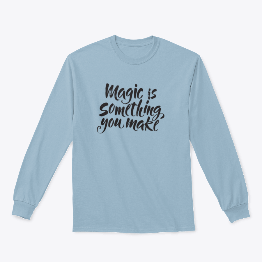 A soft cotton t-shirt featuring the inspirational quote 'Magic Is Something You Make' in a stylish design, perfect for casual wear.