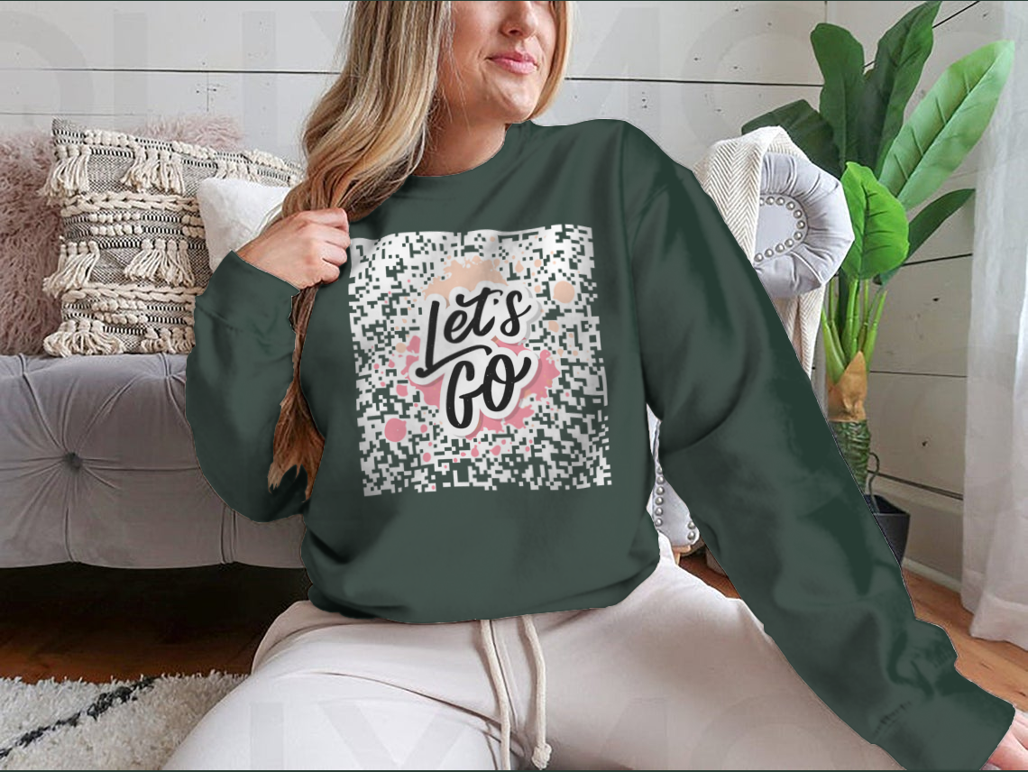A stylish t-shirt featuring the motivational phrase 'Let's Go' in modern calligraphy ink painting, showcasing a blend of artistic design and comfort.