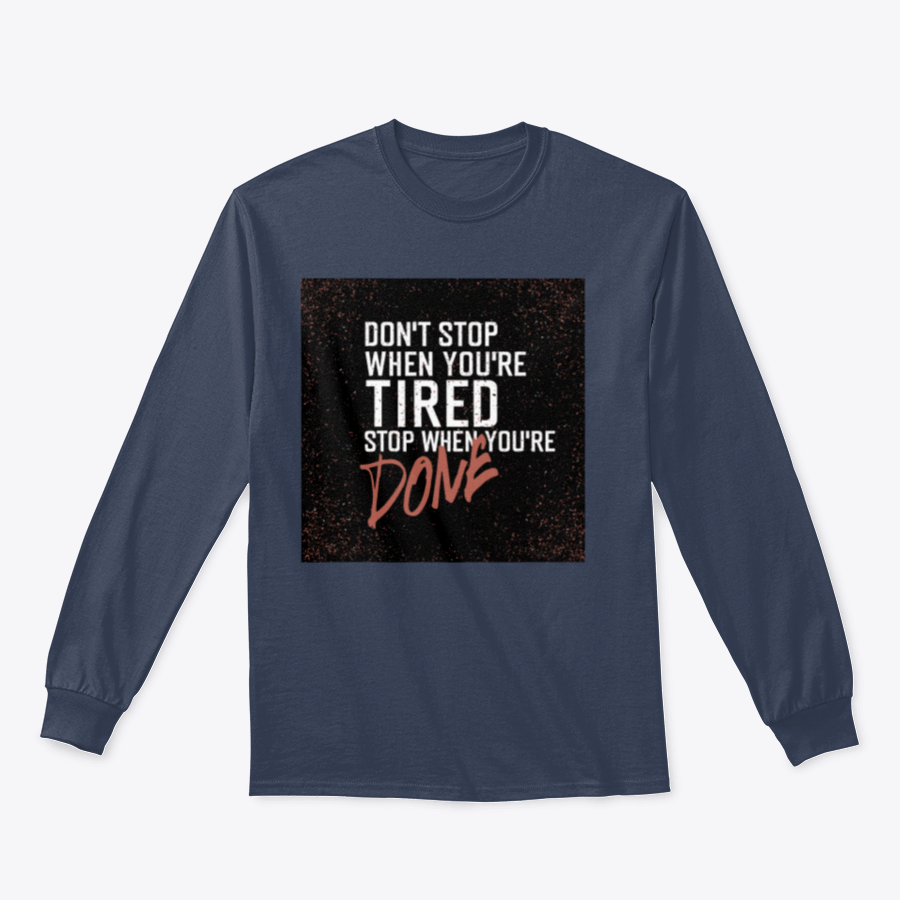 Motivational poster with the quote 'Don't Stop When You're Tired' displayed in a stylish setting, emphasizing inspiration and determination.