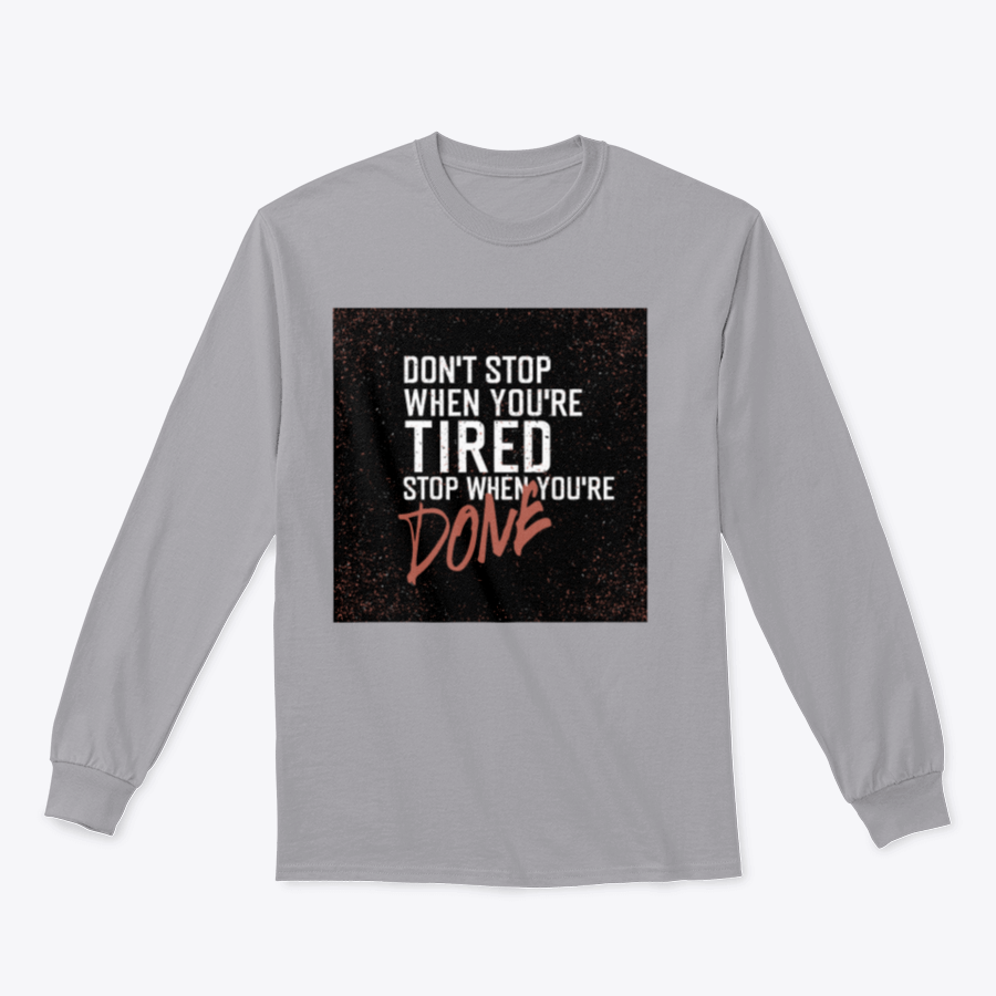 Motivational poster with the quote 'Don't Stop When You're Tired' displayed in a stylish setting, emphasizing inspiration and determination.