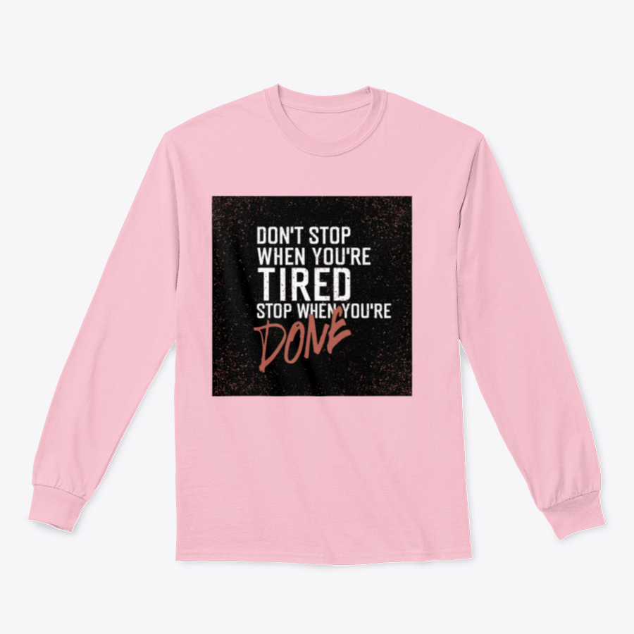 Motivational poster with the quote 'Don't Stop When You're Tired' displayed in a stylish setting, emphasizing inspiration and determination.