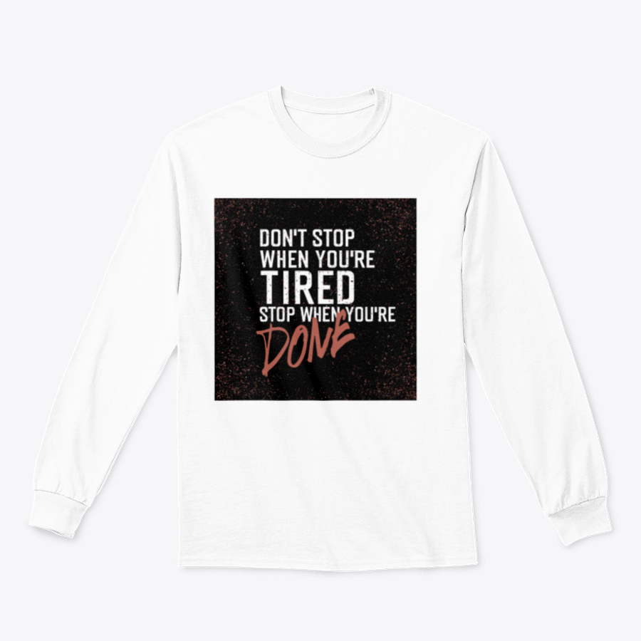 Motivational poster with the quote 'Don't Stop When You're Tired' displayed in a stylish setting, emphasizing inspiration and determination.