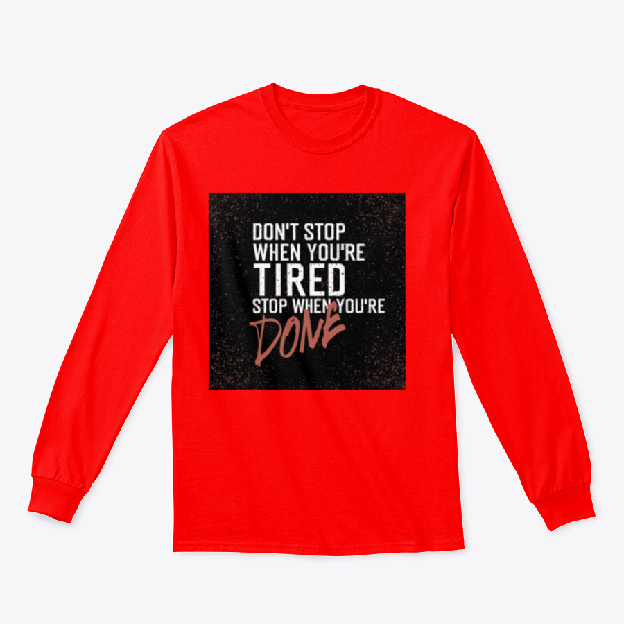 Motivational poster with the quote 'Don't Stop When You're Tired' displayed in a stylish setting, emphasizing inspiration and determination.
