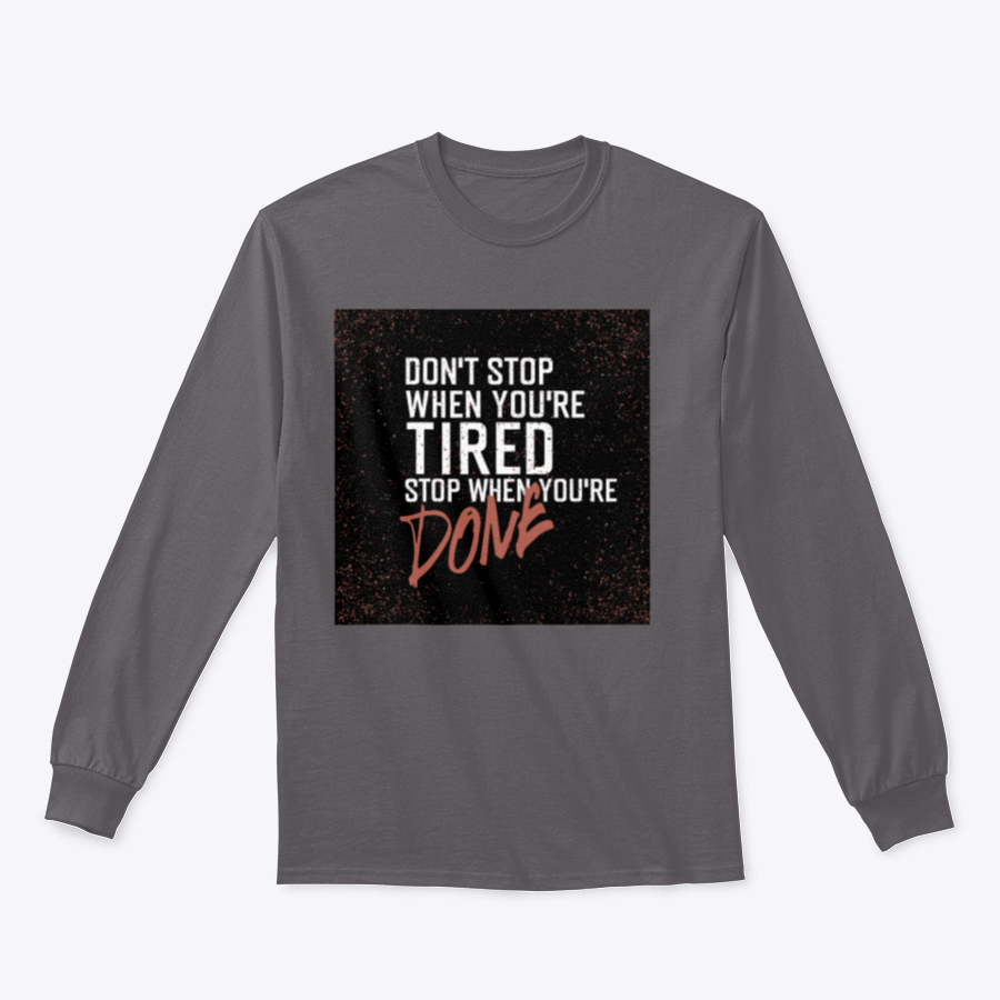 Motivational poster with the quote 'Don't Stop When You're Tired' displayed in a stylish setting, emphasizing inspiration and determination.