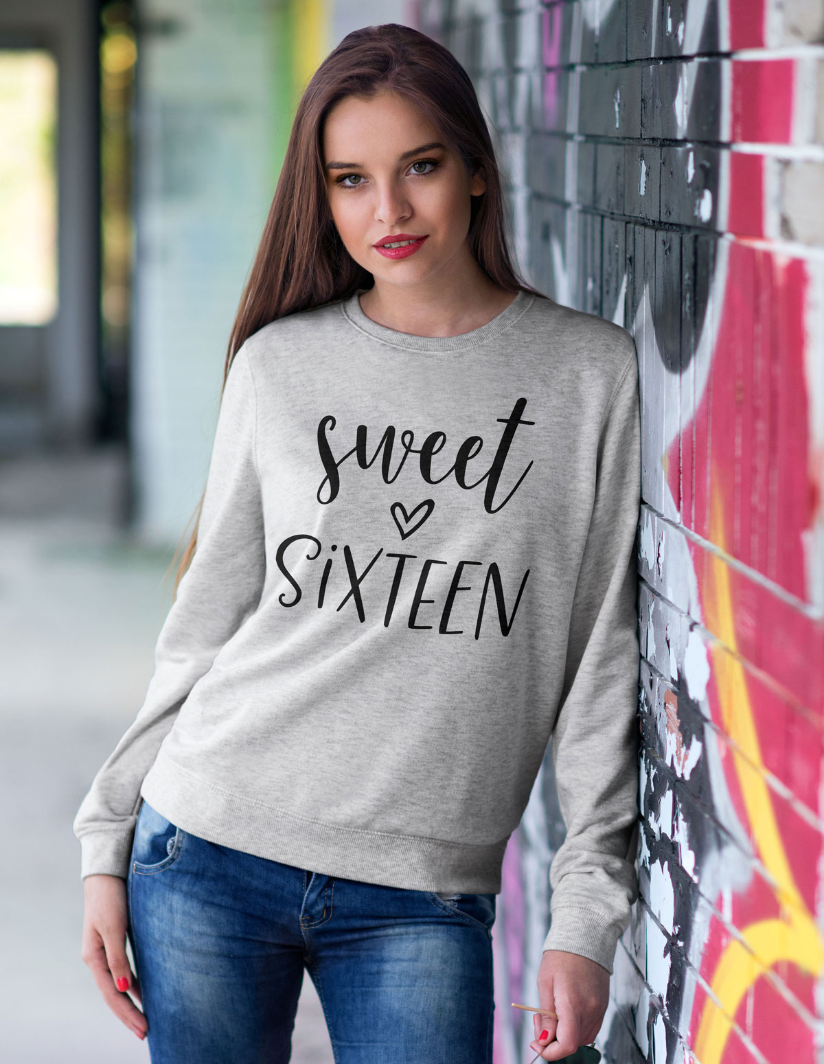 A cozy Sweet Sixteen sweatshirt featuring a classic fit, made from a soft cotton-polyester blend, perfect for celebrating special occasions.