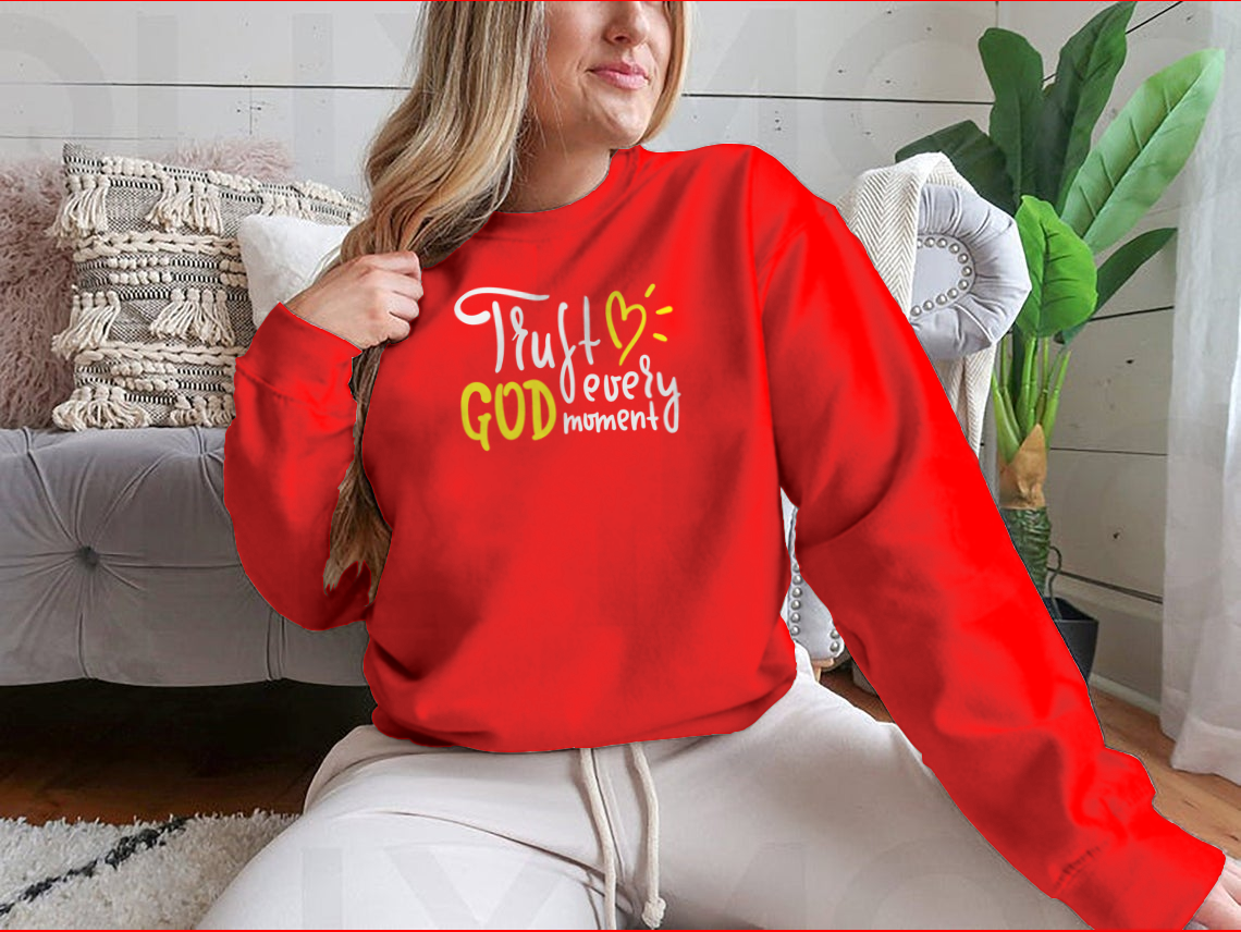 Trust God Every Moment T-shirt featuring a motivational religious quote, made from soft cotton fabric in a classic fit.