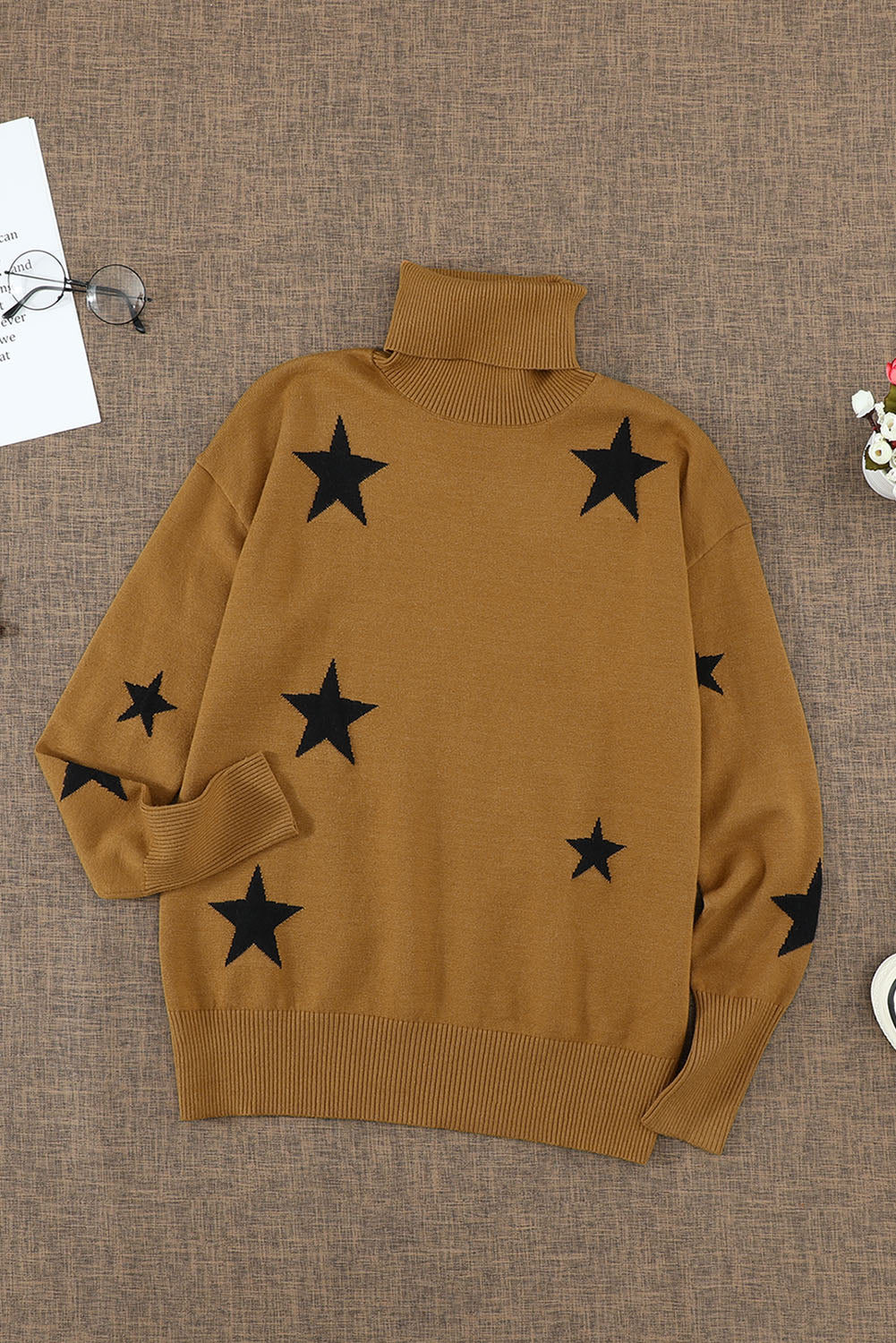 A cozy Turtleneck Star Print Sweater featuring a stylish star pattern, perfect for winter wear.
