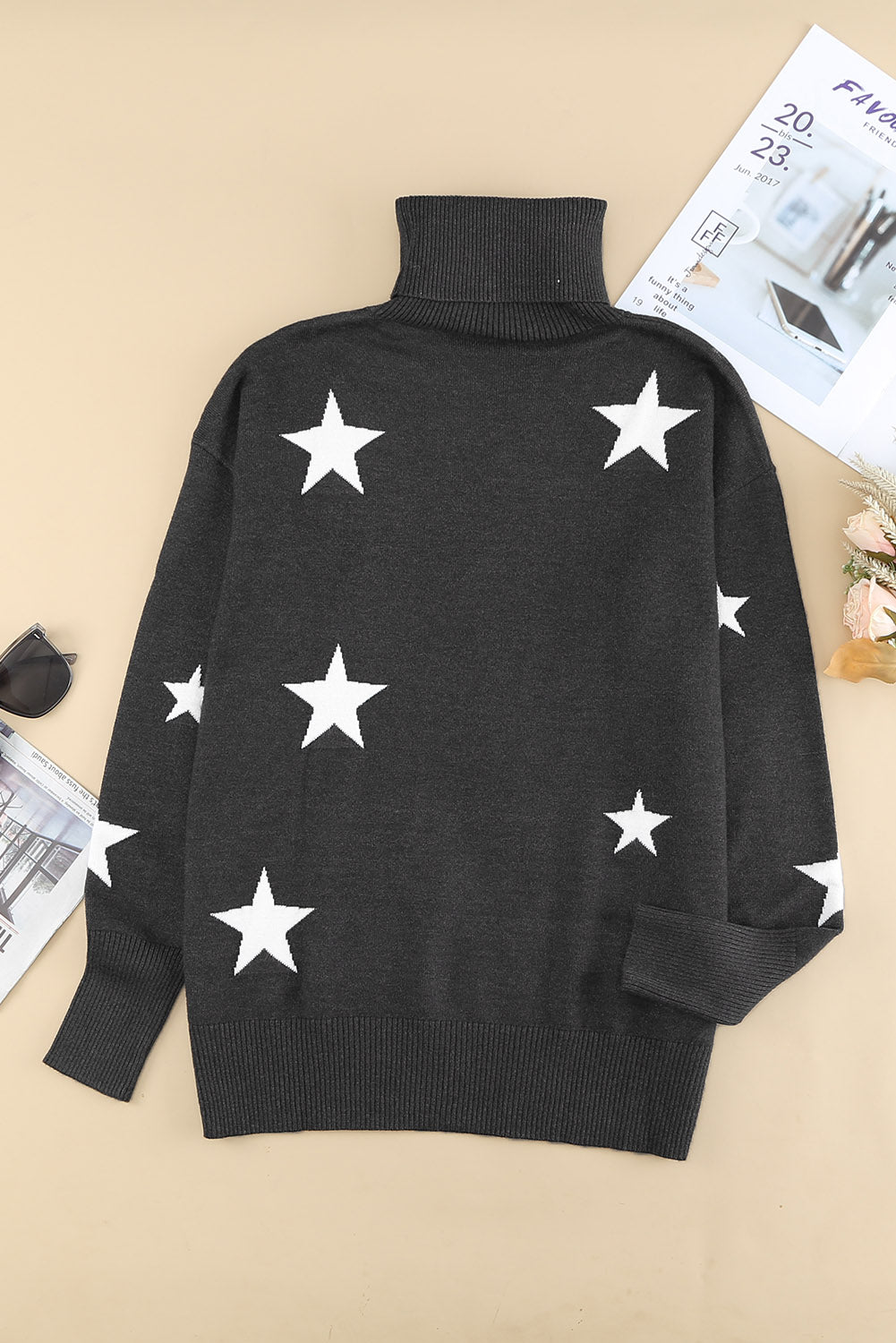 A cozy Turtleneck Star Print Sweater featuring a stylish star pattern, perfect for winter wear.