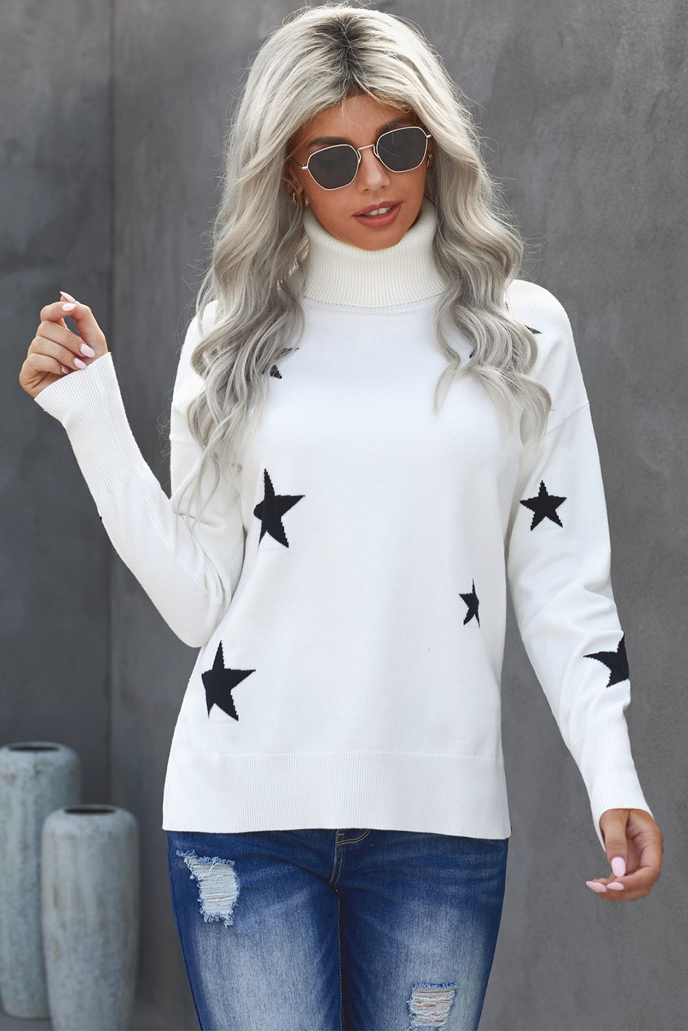 A cozy Turtleneck Star Print Sweater featuring a stylish star pattern, perfect for winter wear.