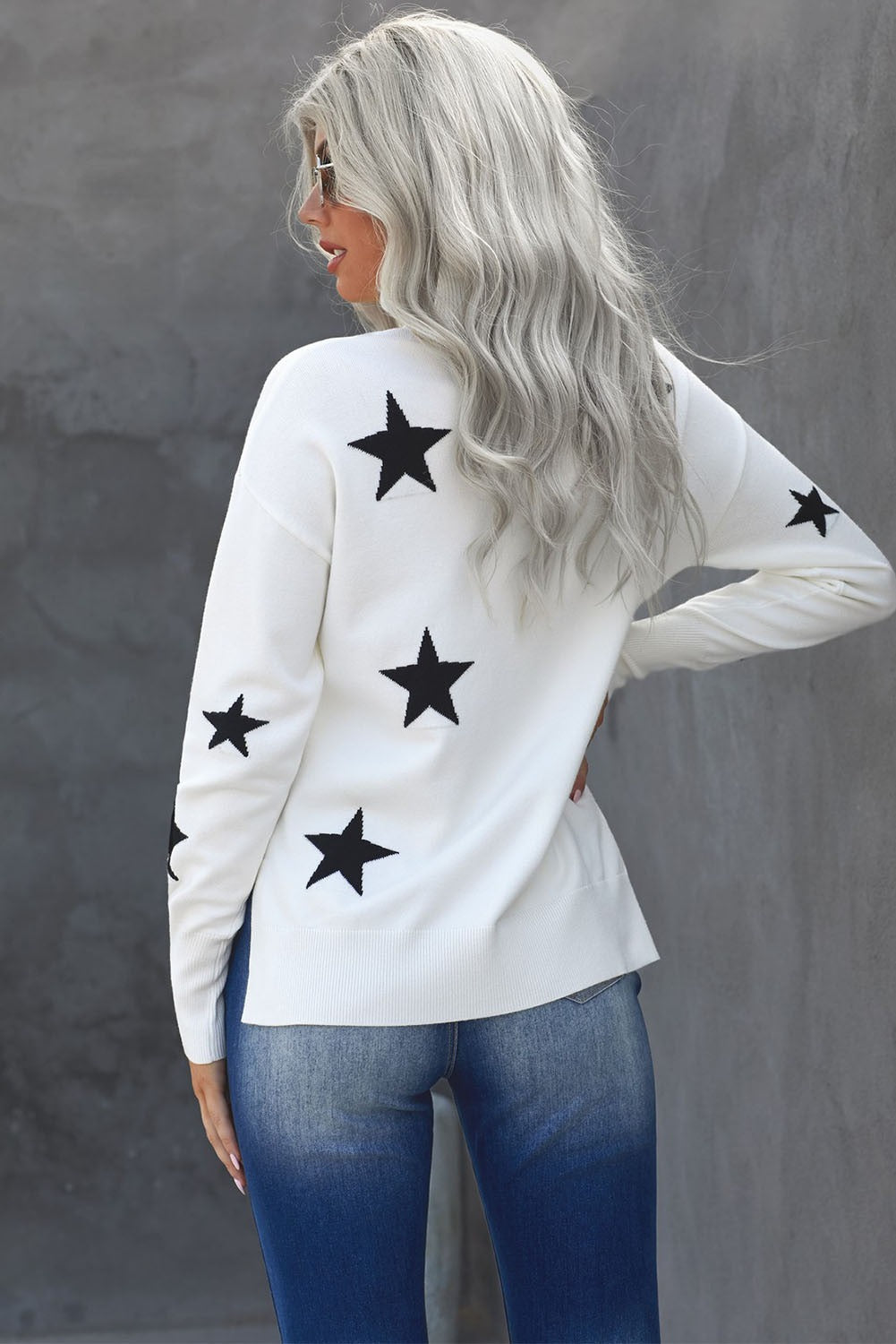 A cozy Turtleneck Star Print Sweater featuring a stylish star pattern, perfect for winter wear.