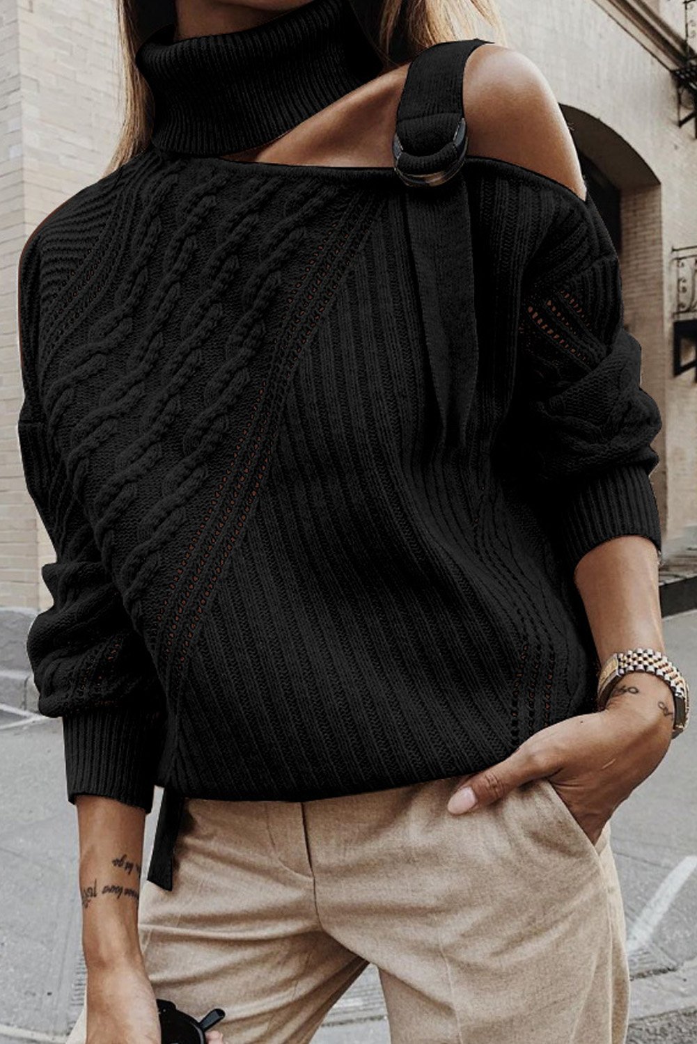 Winter Black Strapped Cut out Shoulder Turtleneck Sweater showcasing chic design and soft fabric, perfect for winter layering.