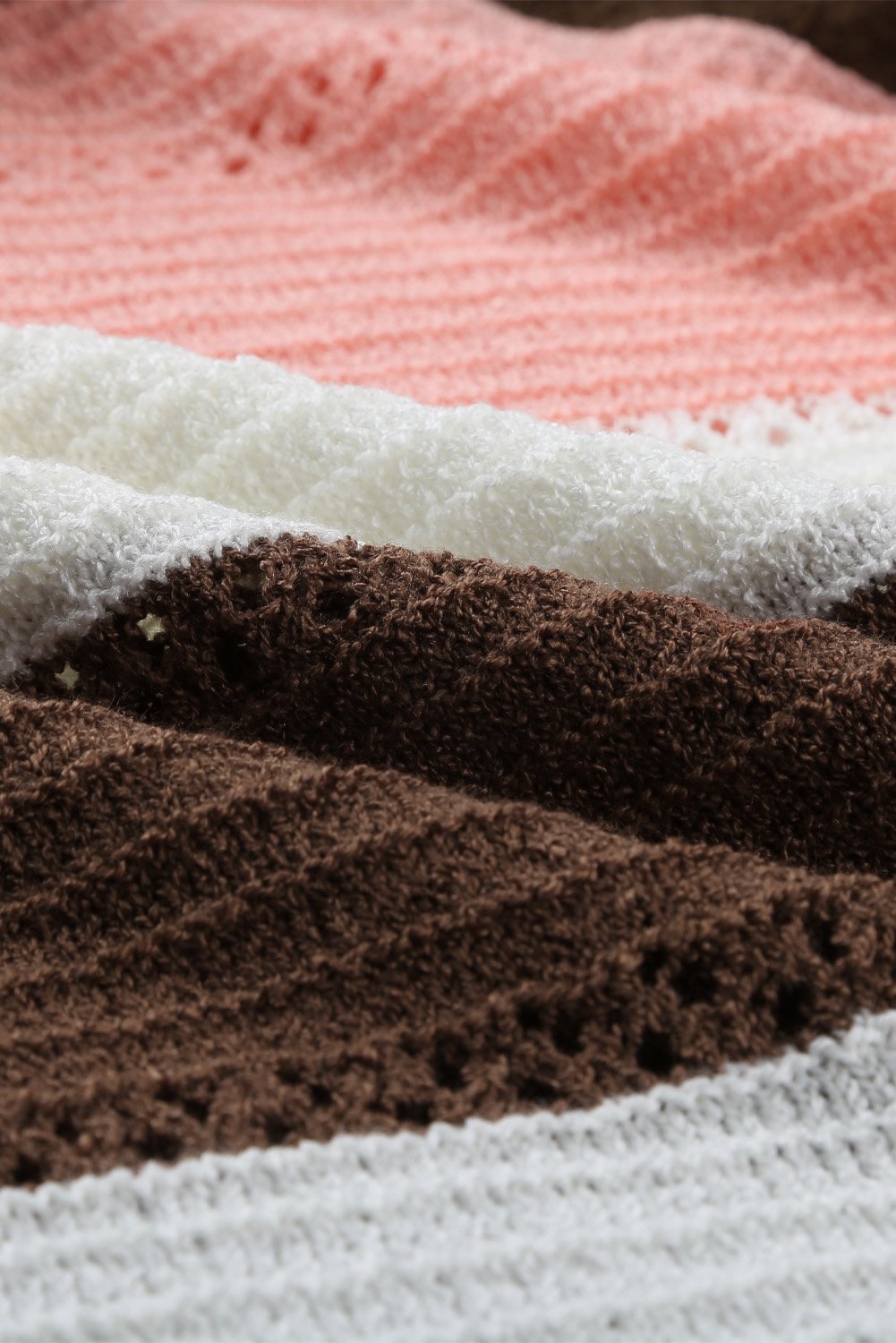 Women's Brown Beach Bonfire Knitted Hoodie displayed on a mannequin, showcasing its stylish design and cozy fabric.