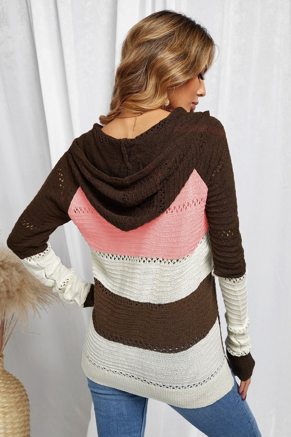 Women's Brown Beach Bonfire Knitted Hoodie displayed on a mannequin, showcasing its stylish design and cozy fabric.