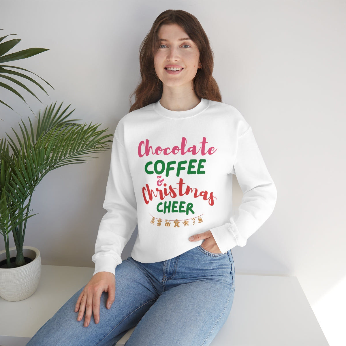 Womens Christmas Cheer Sweatshirt in festive colors, showcasing a loose fit and ribbed collar, perfect for holiday celebrations.