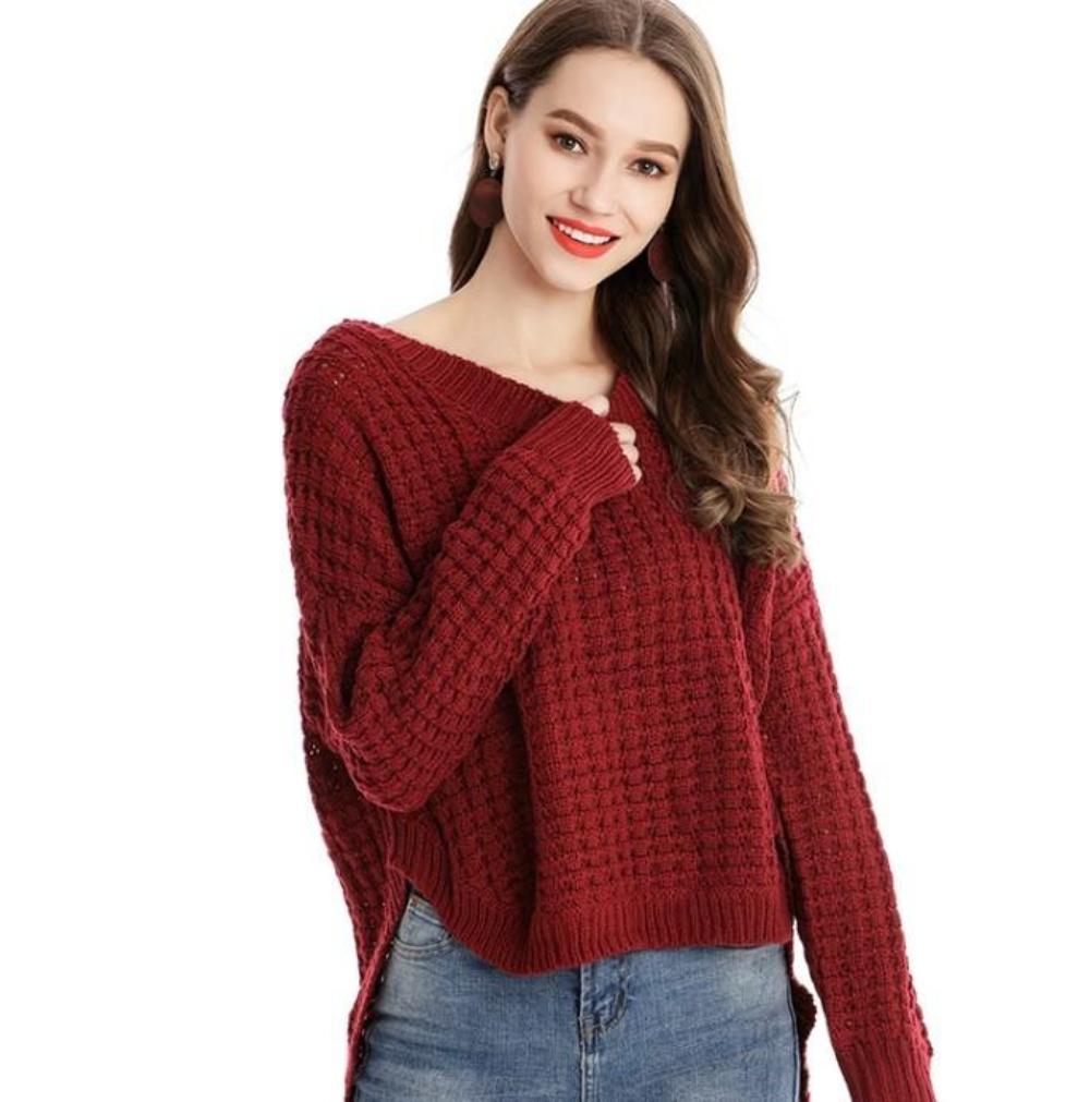 A stylish Womens Crewneck Uneven Sweater in red, featuring a trendy uneven hemline and a comfortable fit, perfect for casual wear.