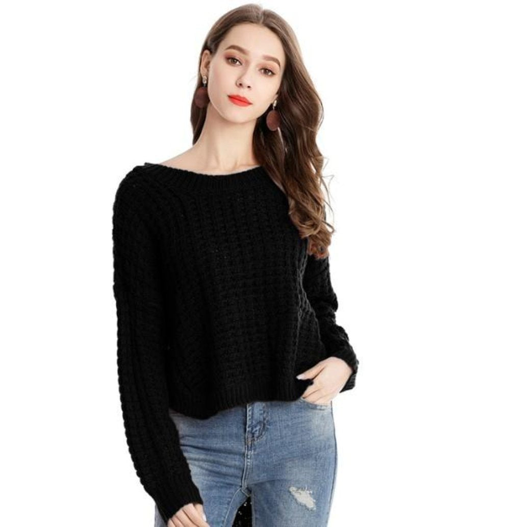 A stylish Womens Crewneck Uneven Sweater in red, featuring a trendy uneven hemline and a comfortable fit, perfect for casual wear.