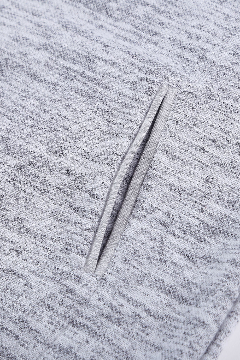 Women's gray casual hoodie featuring a pocket design and buttoned front, perfect for stylish comfort.