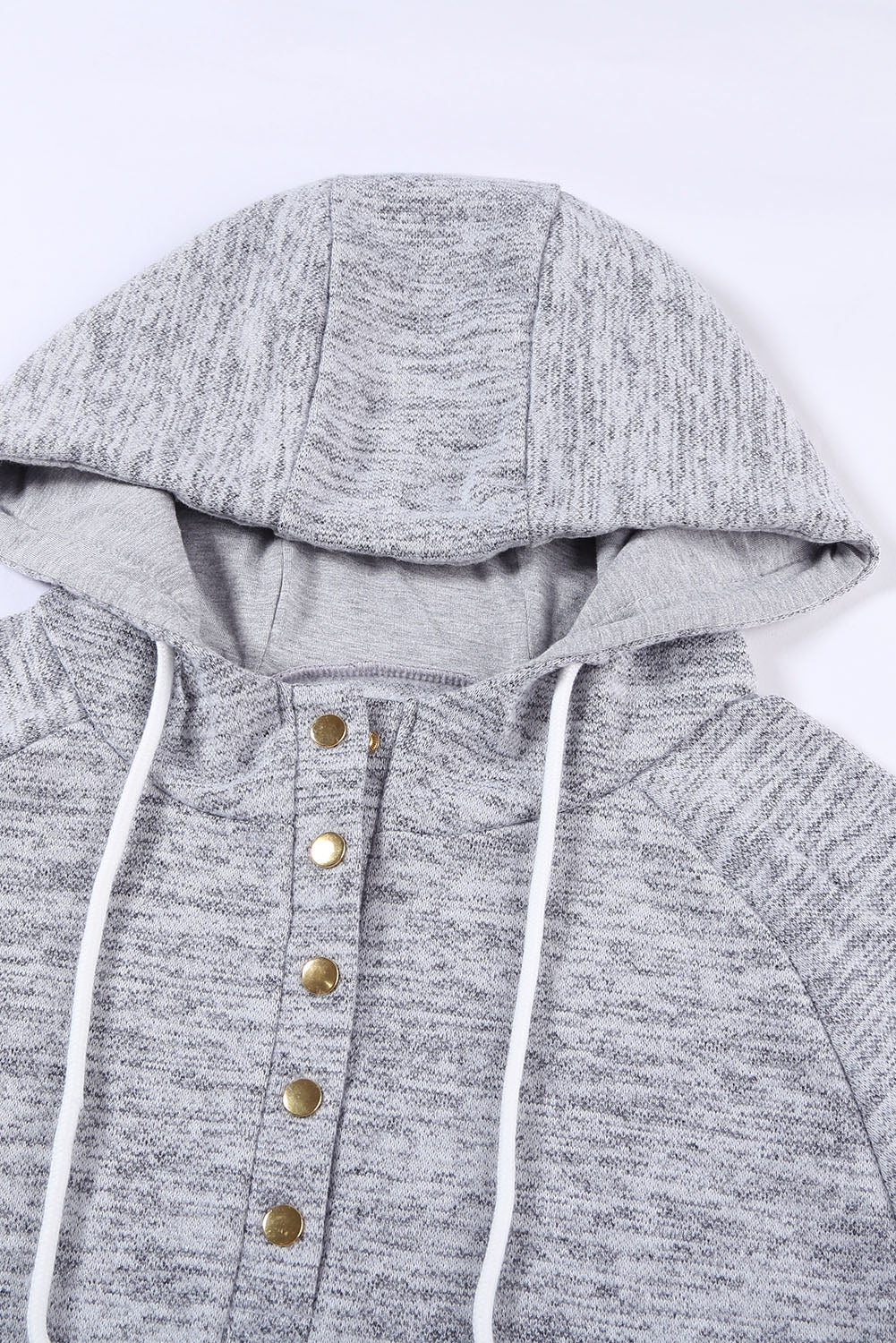 Women's gray casual hoodie featuring a pocket design and buttoned front, perfect for stylish comfort.