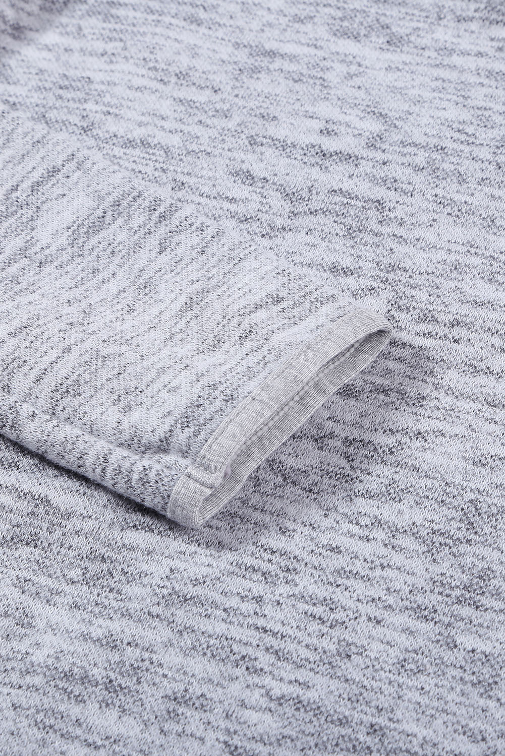 Women's gray casual hoodie featuring a pocket design and buttoned front, perfect for stylish comfort.