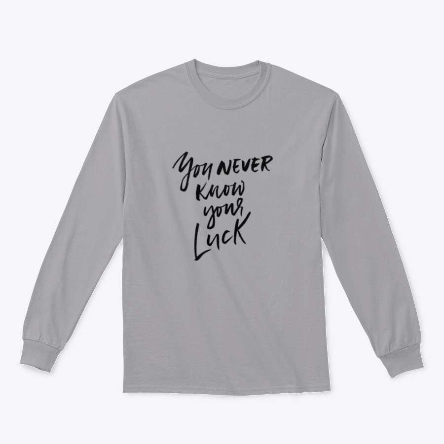 A stylish apparel featuring the phrase 'You Never Know Your Luck' in dry brush calligraphy, showcasing a comfortable fit and quality fabric.