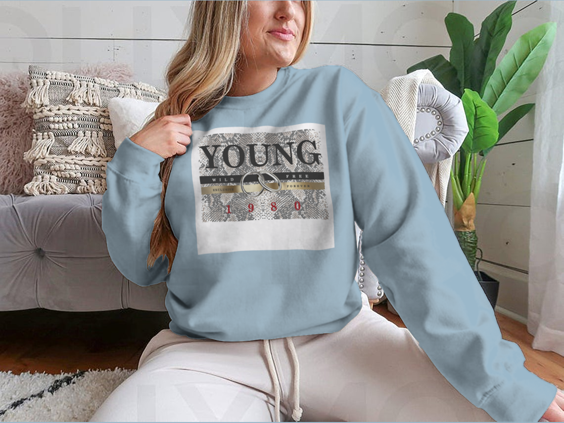 Stylish Young Slogan T-shirt featuring a snake skin pattern background and elegant gold foil print.