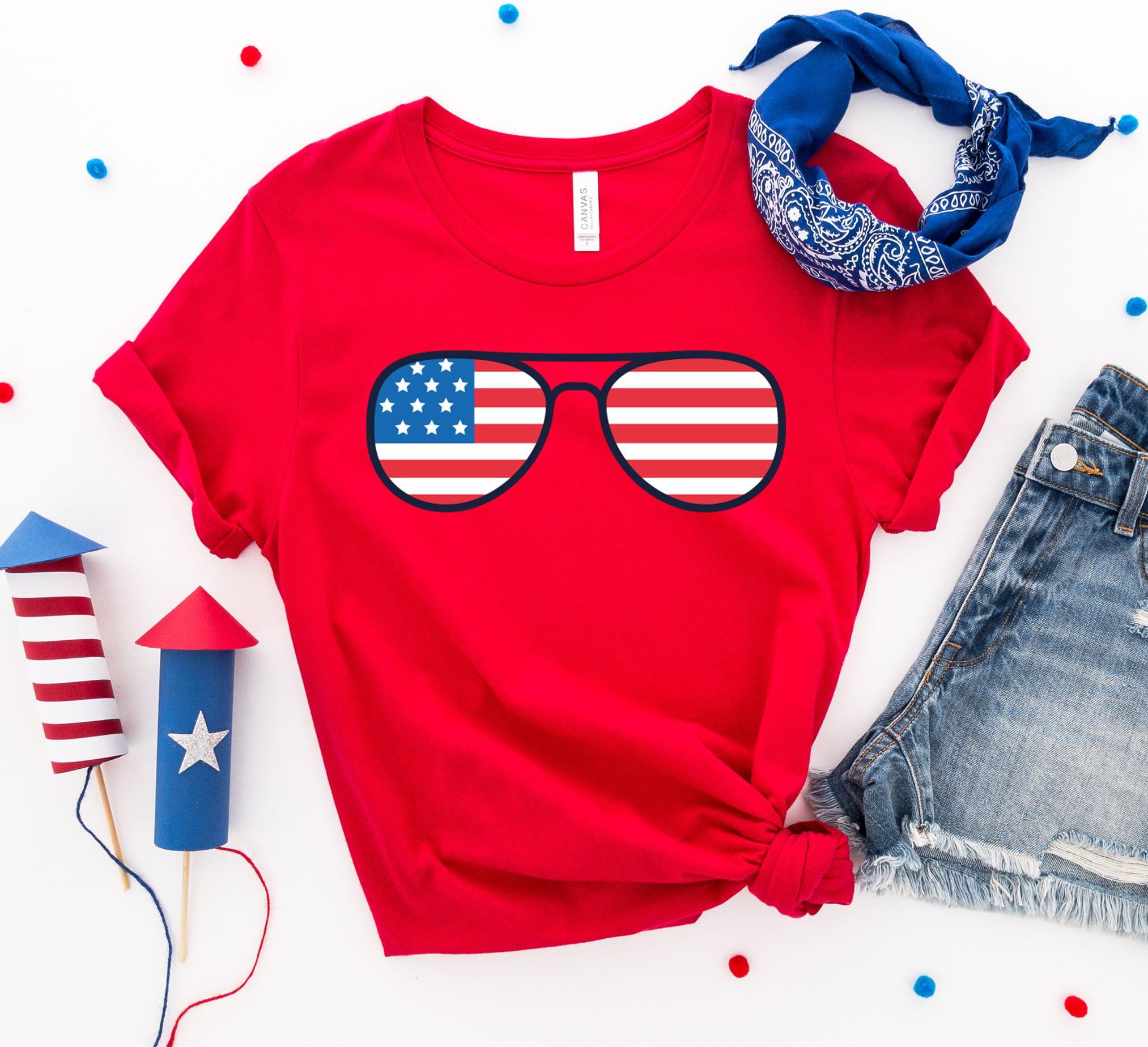 A stylish 4th of July Sunglasses T-shirt featuring a vibrant design, made from premium ring spun cotton for comfort and durability.