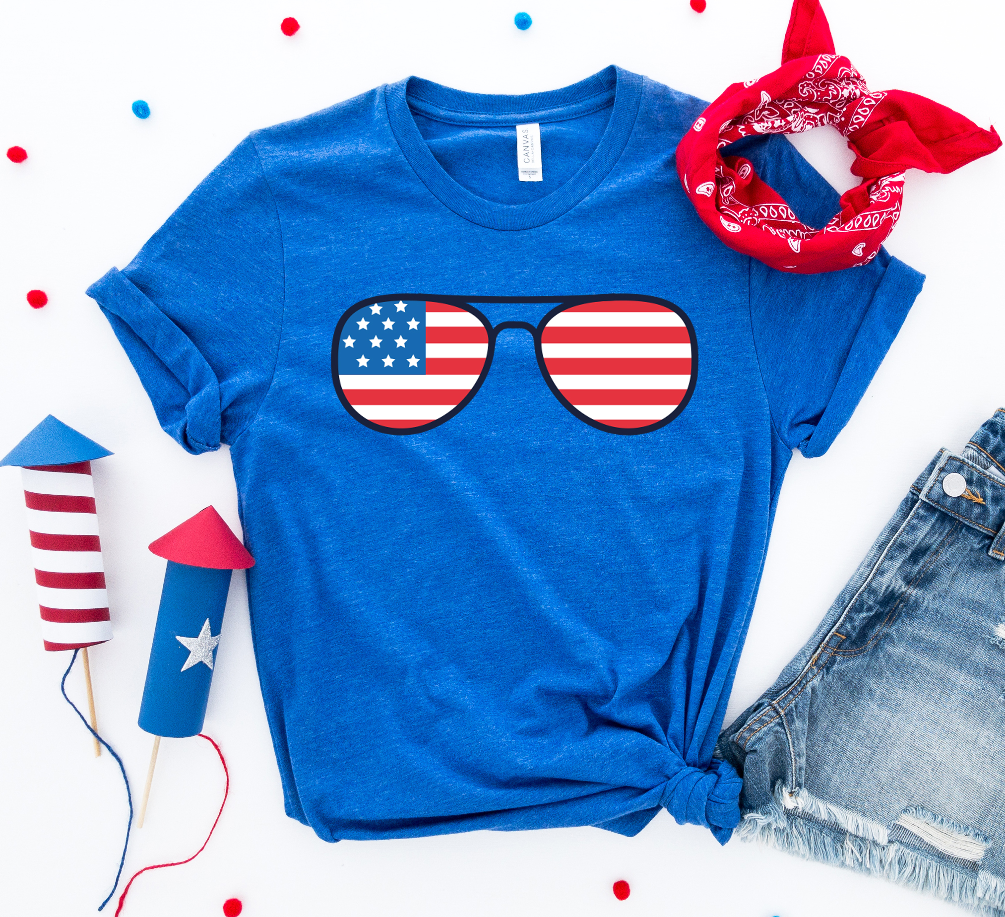 A stylish 4th of July Sunglasses T-shirt featuring a vibrant design, made from premium ring spun cotton for comfort and durability.