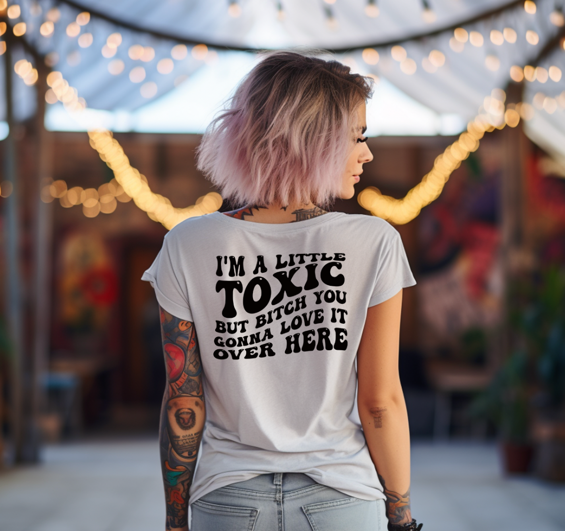 A Little Toxic Unisex T-shirt featuring a unique back print design, showcasing vibrant colors and comfortable fabric.