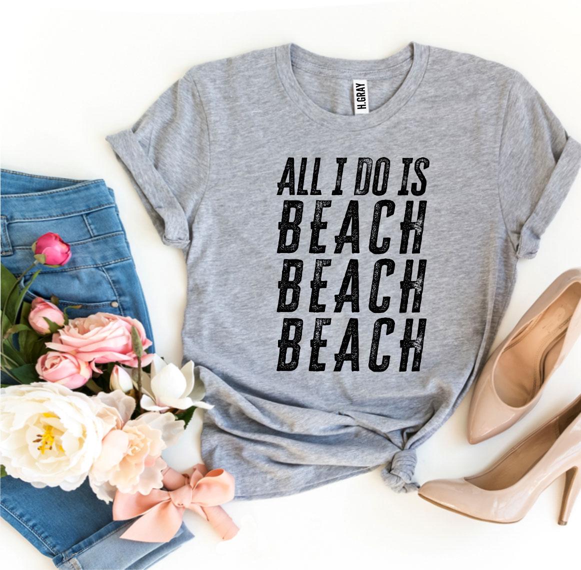 All I Do Is Beach Beach Beach T-shirt in various sizes, showcasing its soft cotton fabric and vibrant print design.
