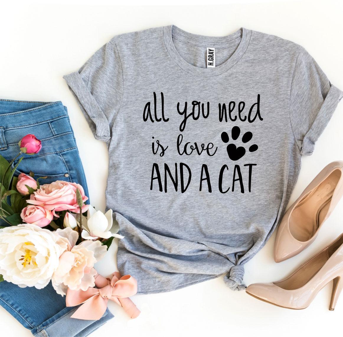 A stylish 'All You Need Is Love And a Cat' T-Shirt made from premium ring spun cotton, featuring a vibrant flex print design.