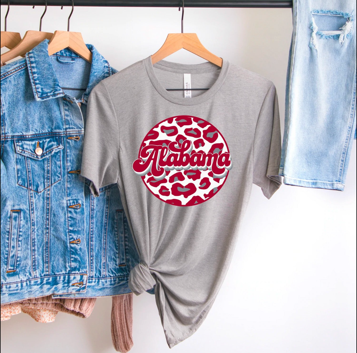 Alabama Retro Leopard Circle Unisex T-shirt featuring a vibrant leopard print design on a soft fabric.