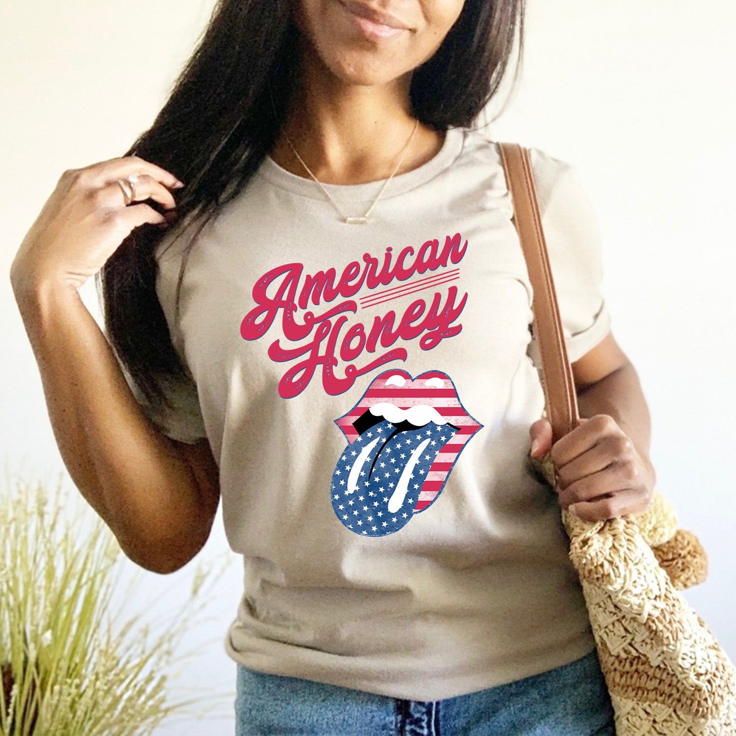 American Honey Lips Unisex T-shirt featuring vibrant graphic design and soft fabric.