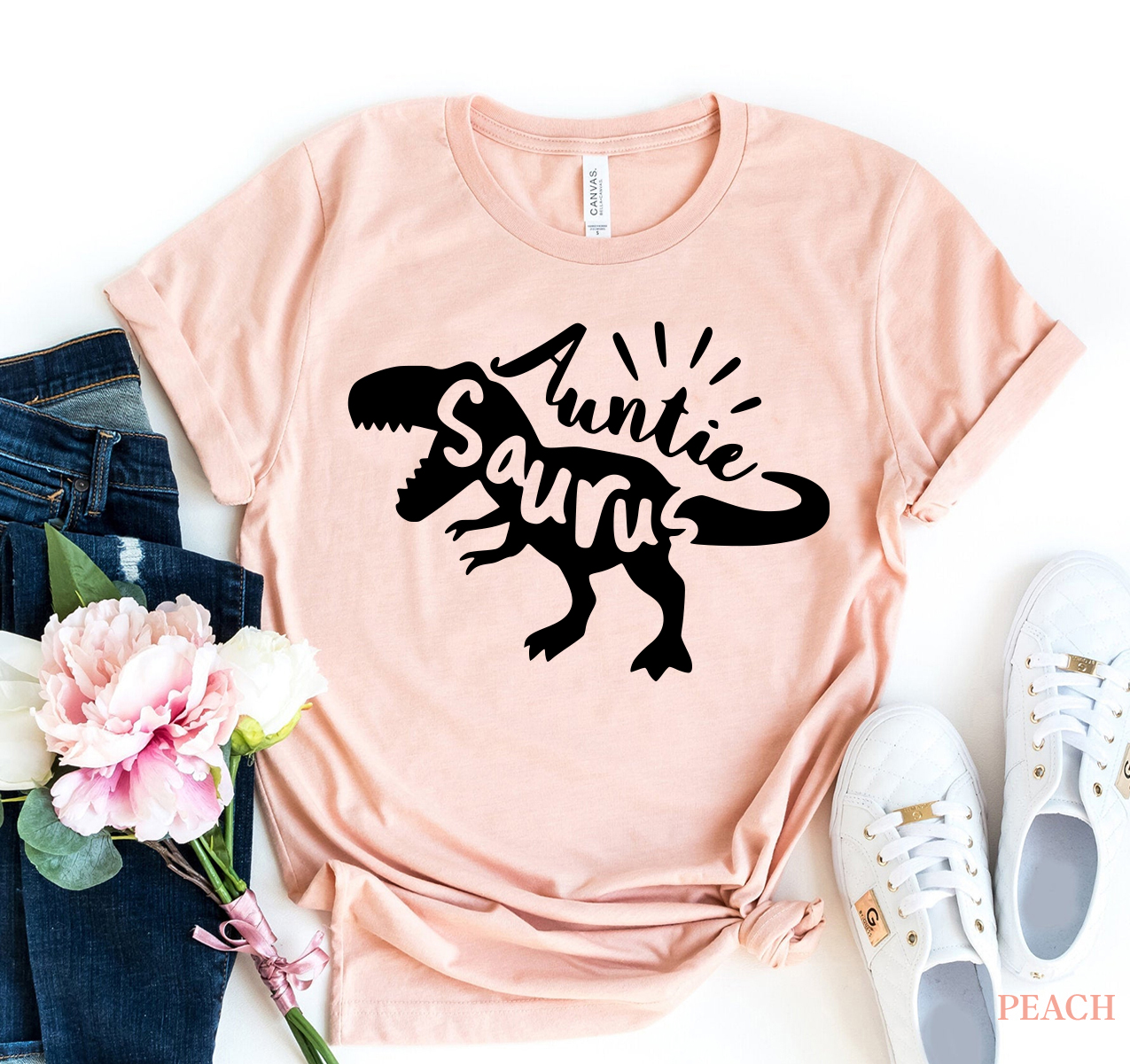 Auntie Saurus T-shirt featuring a vibrant dinosaur design on premium ring spun cotton fabric.